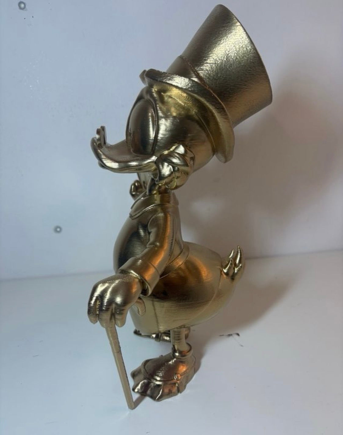 Scrooge Mc Duck Statua 3D con Moneta Usa e Bastone