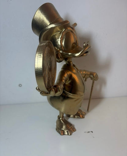 Scrooge Mc Duck Statua 3D con Moneta Usa e Bastone