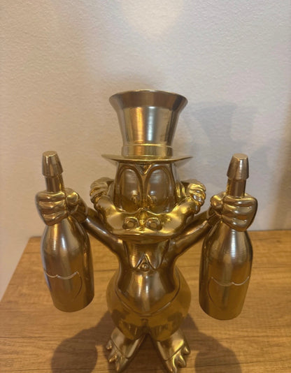 Dagobert Duck Goldstatue mit Dom Pérignon Champagner